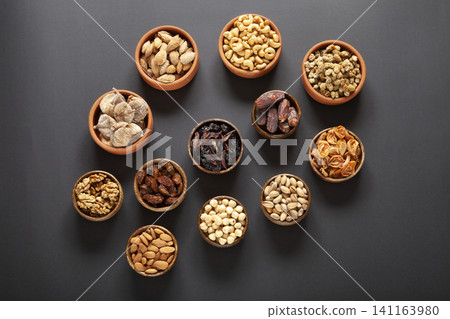 Dried fruits and mixed nuts. Healthy foods. Dried fruits and mixed nuts. Healthy foods. 141163980