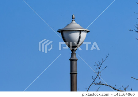 Blue sky and retro streetlights Blue sky and retro streetlights 141164060