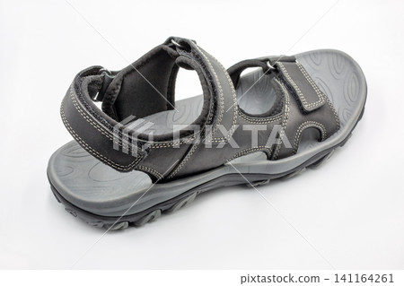 Sport sandals with velcro straps pair closeup. Sport sandals with velcro straps pair closeup. 141164261