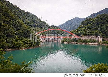 Red bridge in the canyon 141164282