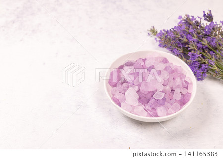 Lavender bath salts for home spa wellness treatment Lavender bath salts for home spa wellness treatment 141165383