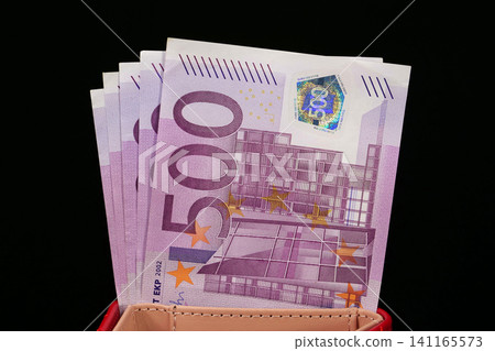 European Union money. 2500 Euros in five 500 euro banknotes. Cash, finance, savings European Union money. 2500 Euros in five 500 euro banknotes. Cash, finance, savings 141165573