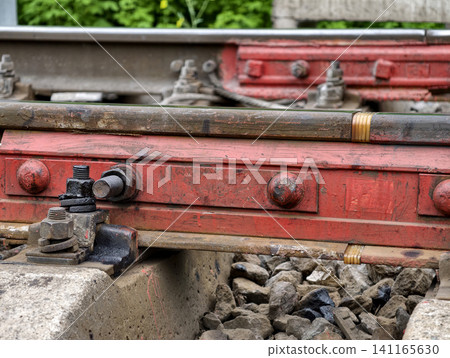 Insulating rail pad ensures railway safety by separating metal components in track joints Insulating rail pad ensures railway safety by separating metal components in track joints 141165630