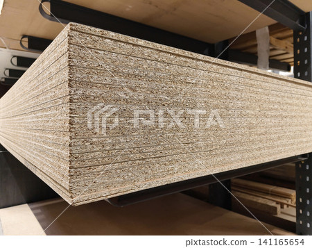 OSB, Oriented Strand Board, construction panel made from wood strand sold in building supermarket OSB, Oriented Strand Board, construction panel made from wood strand sold in building supermarket 141165654