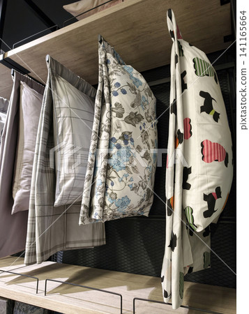 Home showroom with variety of pillows and cushion covers displayed Home showroom with variety of pillows and cushion covers displayed 141165664