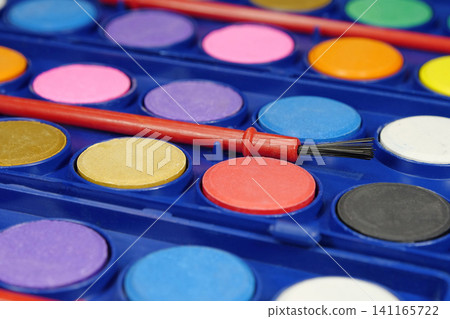 Professional watercolor palette with a variety of colors for painting projects and artistic expression Professional watercolor palette with a variety of colors for painting projects and artistic expression 141165722