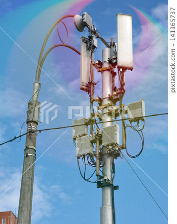 A mobile communications tower releasing radiation that could be dangerous for the health of people and animals in the area 141165737