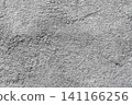 Closeup grainy gray surface texture with rough granular detail, minimal abstract background 141166256