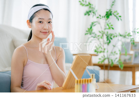 A young woman doing skin care A young woman doing skin care 141167633