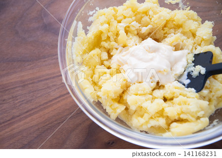 Steamed potatoes and mayonnaise 141168231