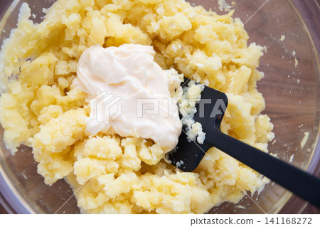 Steamed potatoes and mayonnaise Steamed potatoes and mayonnaise 141168272