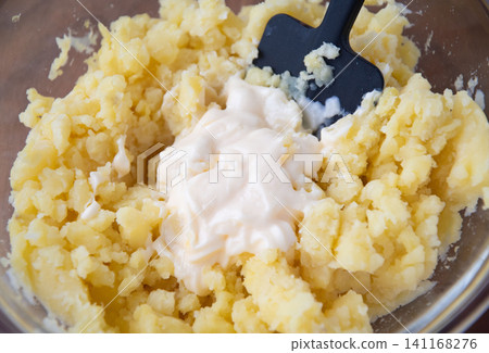 Steamed potatoes and mayonnaise Steamed potatoes and mayonnaise 141168276
