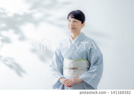 Woman in kimono, kimono, Japanese clothing, beautiful, smiling Woman in kimono, kimono, Japanese clothing, beautiful, smiling 141168382
