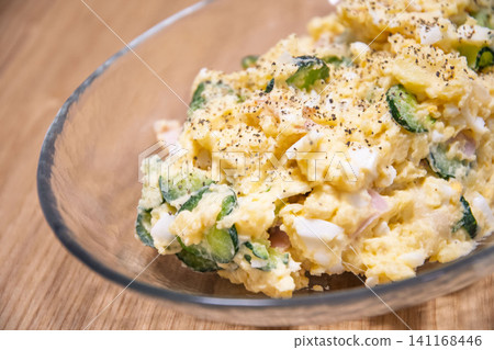 Potato salad served on a plate 141168446