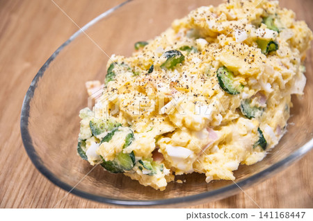 Potato salad served on a plate 141168447