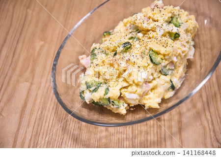 Potato salad served on a plate 141168448