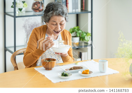 Senior women eating special meals at home Senior women eating special meals at home 141168783