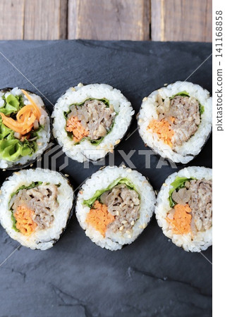 Korean seaweed rolls on a slate plate: Bulgogi Kimbap 141168858