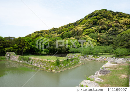 Yamaguchi Prefecture / "Sites of Japan's Meiji Industrial Revolution: Iron and Steel, Shipbuilding, and Coal Mining" Hagi Castle under a blue sky and surrounded by fresh greenery (Hagi Castle Ruins) Yamaguchi Prefecture / "Sites of Japan's Meiji Industrial Revolution: Iron and Steel, Shipbuilding, and Coal Mining" Hagi Castle under a blue sky and surrounded by fresh greenery (Hagi Castle Ruins) 141169097