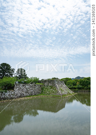 Yamaguchi Prefecture / "Sites of Japan's Meiji Industrial Revolution: Iron and Steel, Shipbuilding, and Coal Mining" Hagi Castle under a blue sky and surrounded by fresh greenery (Hagi Castle Ruins) Yamaguchi Prefecture / "Sites of Japan's Meiji Industrial Revolution: Iron and Steel, Shipbuilding, and Coal Mining" Hagi Castle under a blue sky and surrounded by fresh greenery (Hagi Castle Ruins) 141169103
