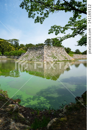 Yamaguchi Prefecture / "Sites of Japan's Meiji Industrial Revolution: Iron and Steel, Shipbuilding, and Coal Mining" Hagi Castle under a blue sky and surrounded by fresh greenery (Hagi Castle Ruins) Yamaguchi Prefecture / "Sites of Japan's Meiji Industrial Revolution: Iron and Steel, Shipbuilding, and Coal Mining" Hagi Castle under a blue sky and surrounded by fresh greenery (Hagi Castle Ruins) 141169112