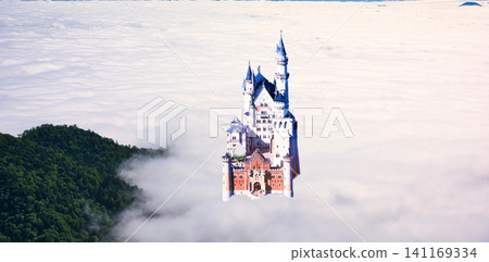 A composite image of Neuschwanstein Castle floating above a sea of pure white clouds. A composite image of Neuschwanstein Castle floating above a sea of pure white clouds. 141169334