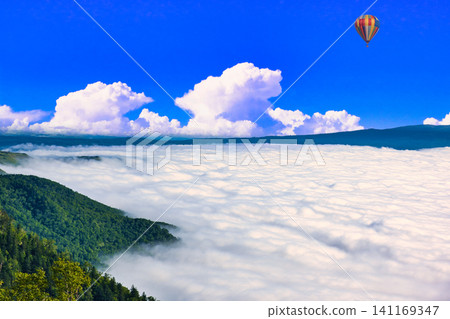A spectacular view of a sea of pure white clouds and pure white cumulonimbus clouds A spectacular view of a sea of pure white clouds and pure white cumulonimbus clouds 141169347
