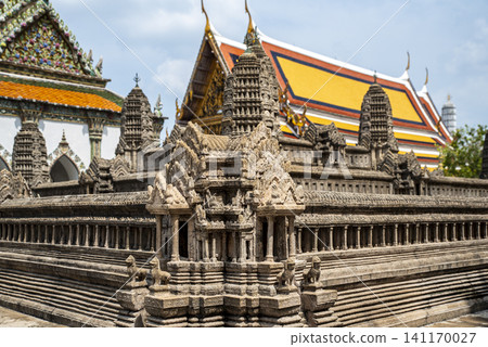 Detailed view of the stone miniature model of Angkor Wat located inside the Wat Phra Kaew (Temple of the Emerald Buddha) complex in Bangkok, Thailand. Detailed view of the stone miniature model of Angkor Wat located inside the Wat Phra Kaew (Temple of the Emerald Buddha) complex in Bangkok, Thailand. 141170027