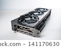Modern High Performance Graphics Card for Gaming PC Build Isolated on White Background View 141170630