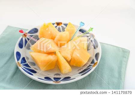 "Golden Overlord," a sliced yellow watermelon. "Golden Overlord," a sliced yellow watermelon. 141170870