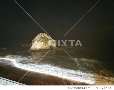 Night view, the illuminated Futatsushima Islands and the Pacific Ocean at night. Night view, the illuminated Futatsushima Islands and the Pacific Ocean at night. 141171343