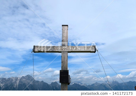 Signpost at the summit of Schallbergkogel mountain in the Austrian Alps. Signpost at the summit of Schallbergkogel mountain in the Austrian Alps. 141172173