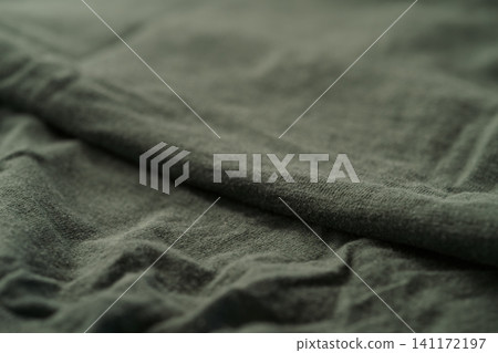 green color linen fabric for clothing closeup green color linen fabric for clothing closeup 141172197