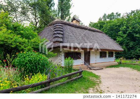 Ancient traditional ukrainian rural house in Pyrohiv (Pirogovo) village near Kiev, Ukraine Ancient traditional ukrainian rural house in Pyrohiv (Pirogovo) village near Kiev, Ukraine 141172274