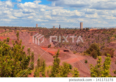 View of huge iron ore quarry in Kryvyi Rih, Ukraine. Open pit mining View of huge iron ore quarry in Kryvyi Rih, Ukraine. Open pit mining 141172278
