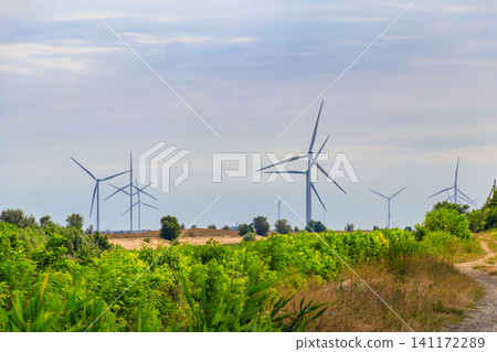 Wind turbines in a field. Renewable energy Wind turbines in a field. Renewable energy 141172289