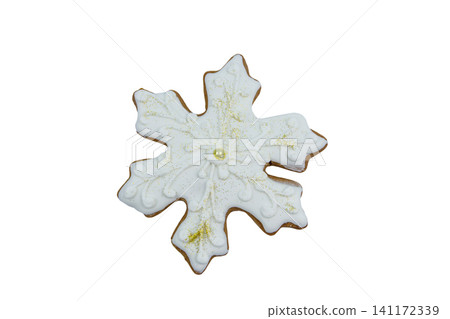 Christmas gingerbread cookie made in shape of snowflake isolated on white background Christmas gingerbread cookie made in shape of snowflake isolated on white background 141172339