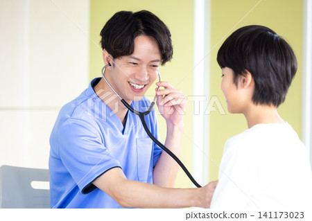 Medical boy receiving medical examination 141173023