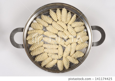 Top View of Raw Cottage Cheese Gnocchi with Chives Top View of Raw Cottage Cheese Gnocchi with Chives 141174425