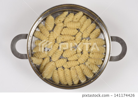 Top View of Cooked Cottage Cheese Gnocchi with Chives Top View of Cooked Cottage Cheese Gnocchi with Chives 141174426