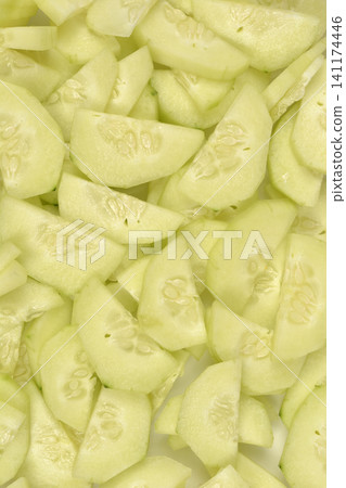 Sliced Peeled Fresh Cucumbers Background Texture Sliced Peeled Fresh Cucumbers Background Texture 141174446