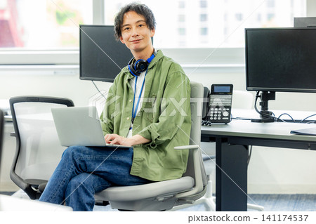 Men working in a company Men working in a company 141174537