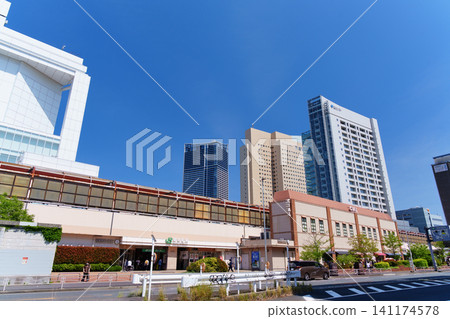 A refreshing blue sky stretches over the modern business district of Sakuragicho, Yokohama. A refreshing blue sky stretches over the modern business district of Sakuragicho, Yokohama. 141174578