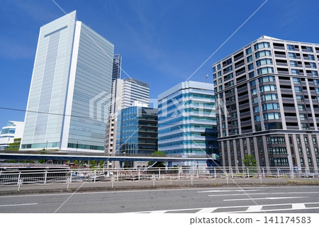 The new Yokohama City Hall bathed in afternoon sunlight, and the ever-evolving modern building district of Sakuragicho and Kitakanaka. The new Yokohama City Hall bathed in afternoon sunlight, and the ever-evolving modern building district of Sakuragicho and Kitakanaka. 141174583