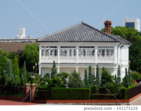 A view of the Minato Ijinkan (Hager House) in Port Island North Park from a sightseeing boat in Kobe Port. A view of the Minato Ijinkan (Hager House) in Port Island North Park from a sightseeing boat in Kobe Port. 141175228