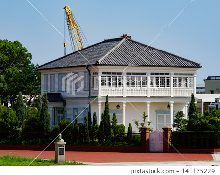 A view of the Minato Ijinkan (Hager House) in Port Island North Park from a sightseeing boat in Kobe Port. A view of the Minato Ijinkan (Hager House) in Port Island North Park from a sightseeing boat in Kobe Port. 141175229