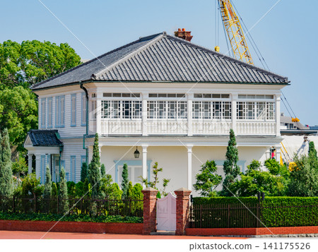 A view of the Minato Ijinkan (Hager House) in Port Island North Park from a sightseeing boat in Kobe Port. A view of the Minato Ijinkan (Hager House) in Port Island North Park from a sightseeing boat in Kobe Port. 141175526