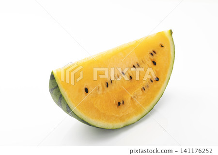A sliced yellow watermelon against a white background. A sliced yellow watermelon against a white background. 141176252