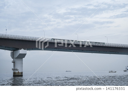 A Port Liner train crossing the Kobe Sky Bridge. A Port Liner train crossing the Kobe Sky Bridge. 141176331