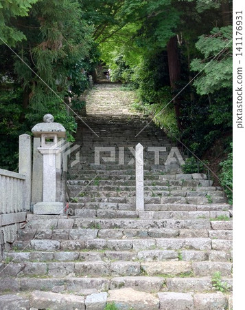The long stone steps leading to the mountain temple The long stone steps leading to the mountain temple 141176931